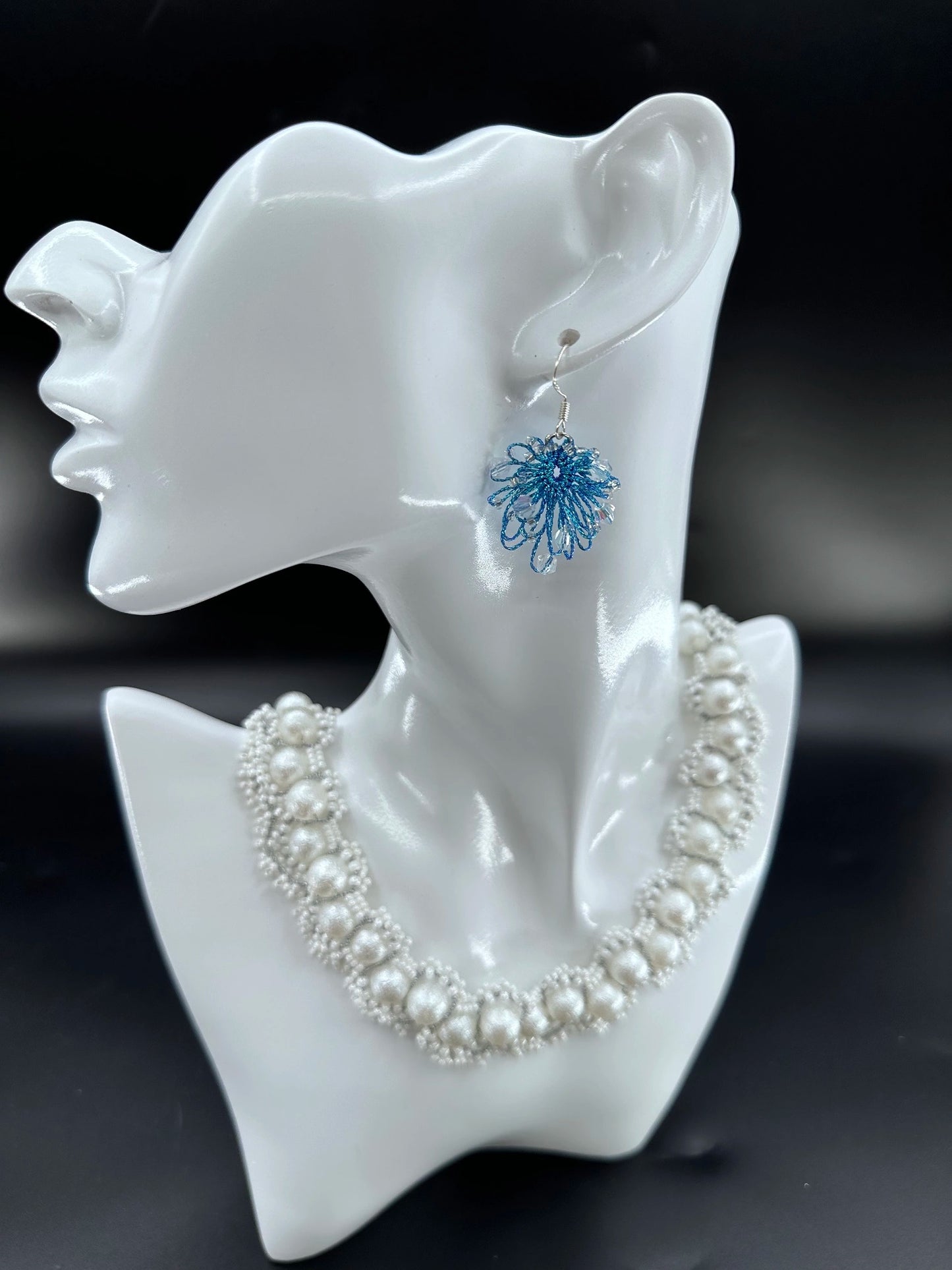 Phoenix Flower tatting earrings with crystal beads, handcrafted in blue, elegantly displayed on a mannequin. Necklace shown is for styling purposes only and sold separately.