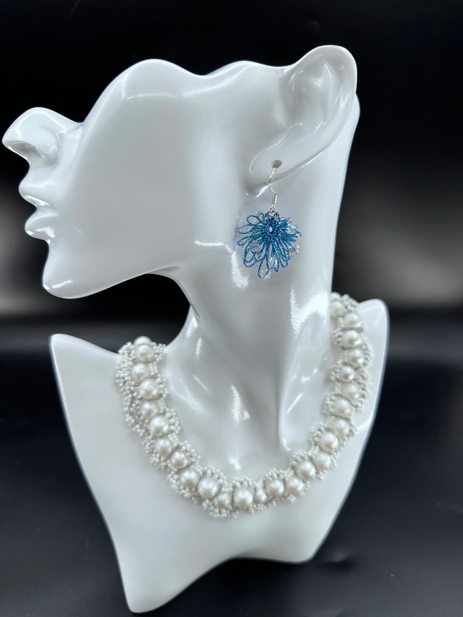 Phoenix Flower tatting earrings with crystal beads, handcrafted in blue, elegantly displayed on a mannequin. Necklace shown is for styling purposes only and sold separately.