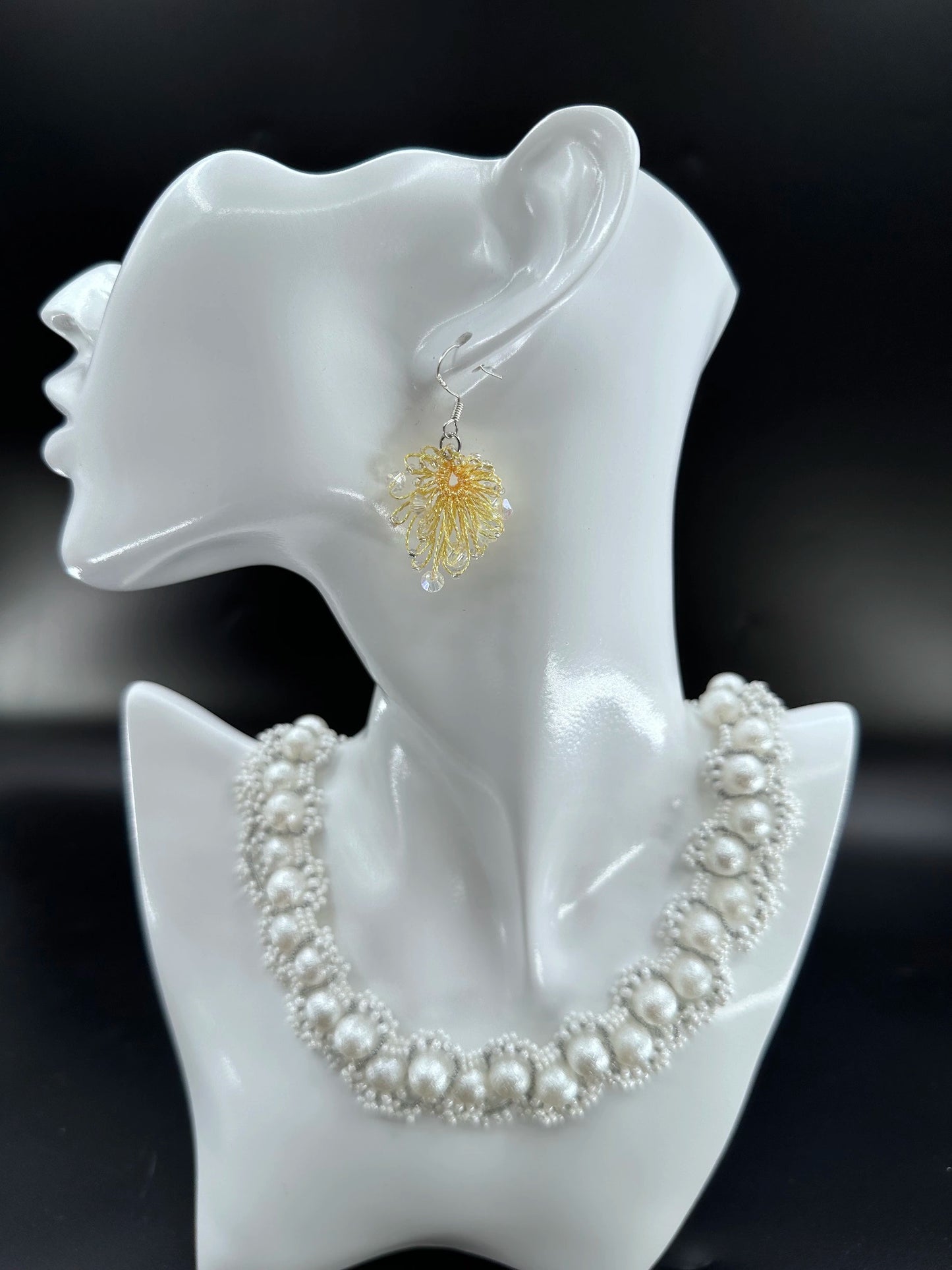 Phoenix Flower tatting earrings with crystal beads, handcrafted in Golden, elegantly displayed on a mannequin. Necklace shown is for styling purposes only and sold separately.