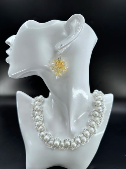 Phoenix Flower tatting earrings with crystal beads, handcrafted in Golden, elegantly displayed on a mannequin. Necklace shown is for styling purposes only and sold separately.