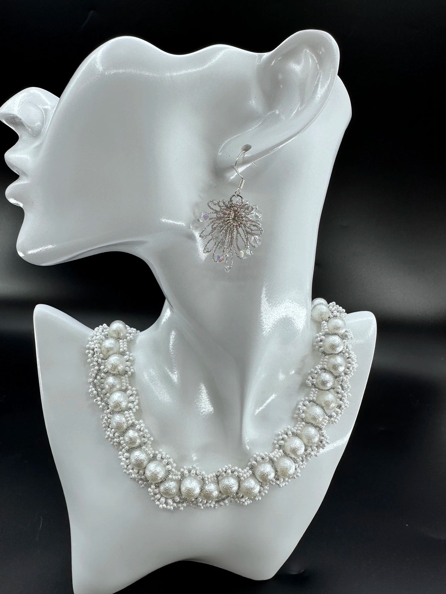 Phoenix Flower tatting earrings with crystal beads, handcrafted in Silver, elegantly displayed on a mannequin. Necklace shown is for styling purposes only and sold separately.