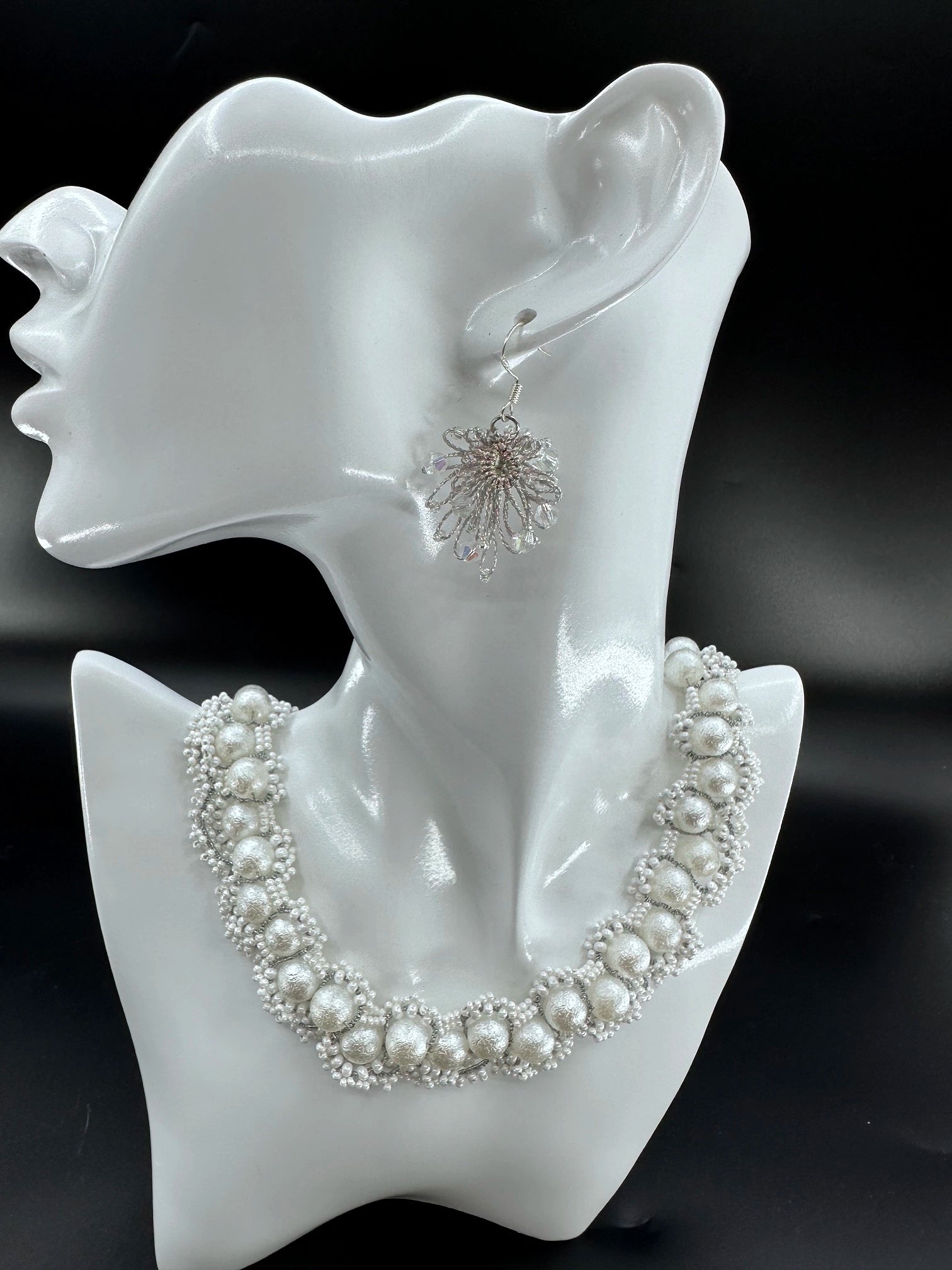 Phoenix Flower tatting earrings with crystal beads, handcrafted in Silver, elegantly displayed on a mannequin. Necklace shown is for styling purposes only and sold separately.