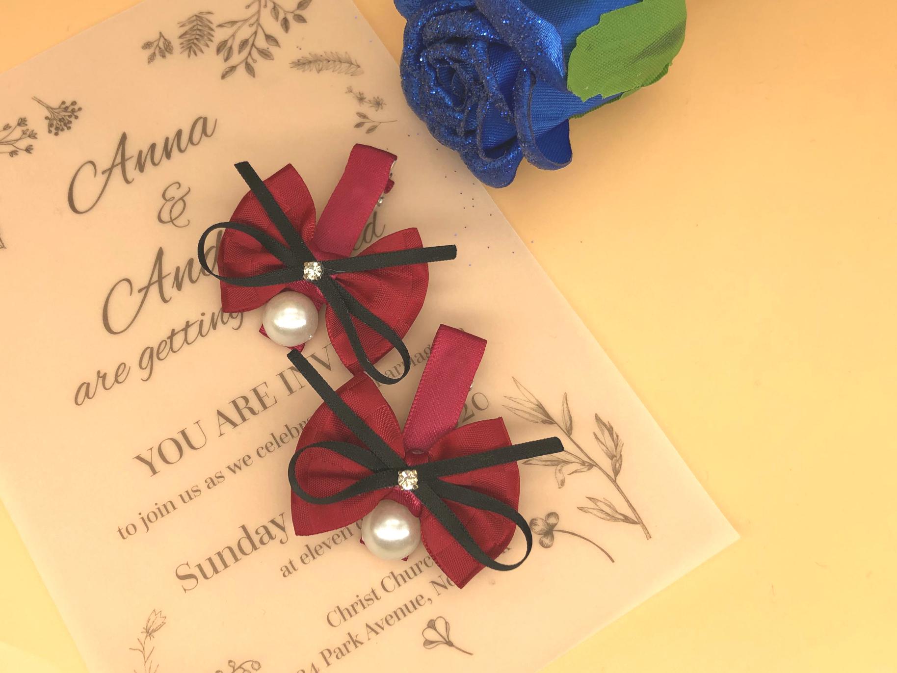 Handmade mini red dragonfly hair clips (pair) with pearl heads, black ribbon detail, and tiny faux diamonds.